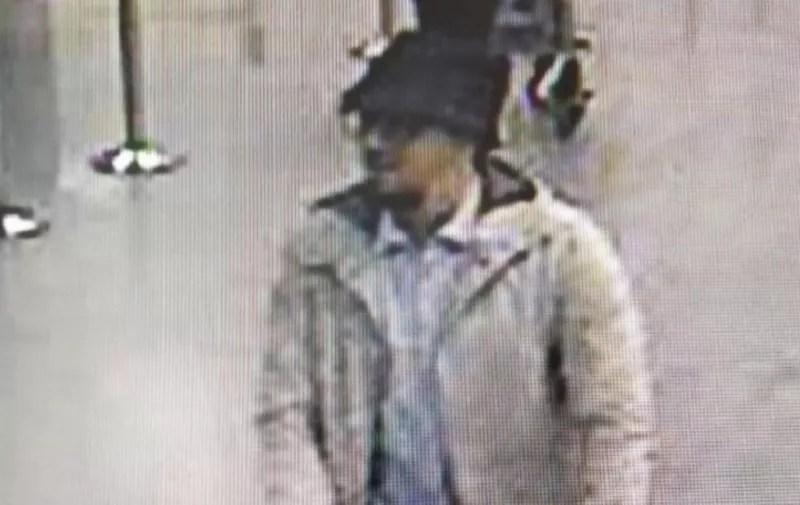 A handout image released on March 22, 2016 by the Belgian Federal Police on demand of the Federal prosecutor shows a screengrab of the airport CCTV camera showing a suspect of this morning's attacks at Brussels Airport, in Zaventem, pushing a trolly with suitcases.
A series of explosions claimed by the Islamic State group ripped through Brussels airport and a metro train today, killing around 35 people in the latest attacks to bring bloody carnage to the heart of Europe. / AFP / BELGIAN FEDERAL POLICE / HO /  - Belgium OUT / RESTRICTED TO EDITORIAL USE - MANDATORY CREDIT "AFP PHOTO / BELGIAN FEDERAL POLICE" - NO MARKETING NO ADVERTISING CAMPAIGNS - DISTRIBUTED AS A SERVICE TO CLIENTS