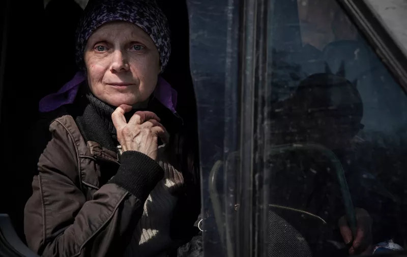 April 7, 2022, Severodontesk, Ukraine: A elderly lady leaving the city waits inside a vehicle driven by a volunteer from the Czech non-governmental organization SOS Vostok. SOS is helping evacuate people who are fleeing the area as Russian troops advance on the region.,Image: 681001679, License: Rights-managed, Restrictions: , Model Release: no, Credit line: Profimedia