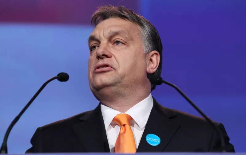 Viktor Orbán, Prime Minister of Hungary, addresses delegates at the Dublin Convention Centre in Dublin, Ireland, on March 7, 2014 during The European Peoples Party (EPP) conference. European conservatives picked former Luxembourg prime minister Jean-Claude Juncker as their candidate to be the next European Commission president -- igniting the centre right grouping's campaign for European elections in May. Juncker comfortably defeated Michel Barnier, a French EU commissioner, at a congress of the European People's Party (EPP) in Dublin by 382 votes to 245. AFP PHOTO / PETER MUHLY