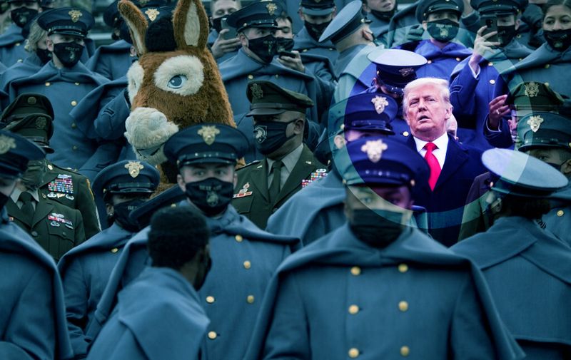 US President Donald Trump joins West Point cadets during the Army-Navy football game at Michie Stadium on December 12, 2020 in West Point, New York. (Photo by Brendan Smialowski / AFP)