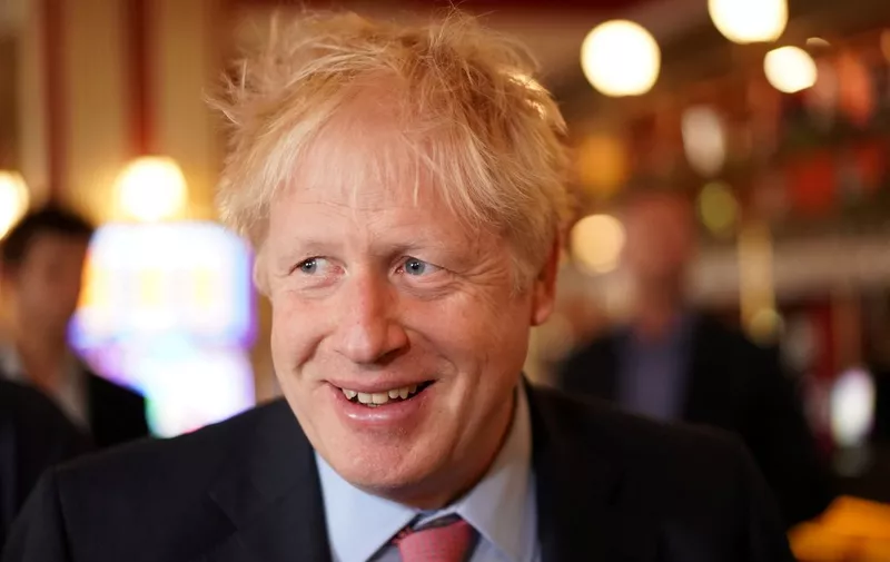 Conservative leadership contender Boris Johnson, reacts during his visit to JD Wetherspoon's Metropolitan Bar in London, on July 10, 2019. (Photo by HENRY NICHOLLS / POOL / AFP)