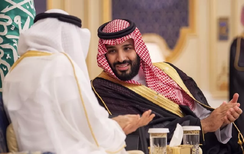 A handout picture provided by the Saudi Royal Palace on June 6, 2018 shows Saudi Crown Prince Prince Mohammed bin Salman attending a meeting with Abu Dhabi Crown Prince Mohammed bin Zayed al-Nahayan (L) in the Saudi coastal Red Sea city of Jeddah. / AFP PHOTO / Saudi Royal Palace / BANDAR AL-JALOUD / RESTRICTED TO EDITORIAL USE - MANDATORY CREDIT "AFP PHOTO / SAUDI ROYAL PALACE / BANDAR AL-JALOUD" - NO MARKETING - NO ADVERTISING CAMPAIGNS - DISTRIBUTED AS A SERVICE TO CLIENTS