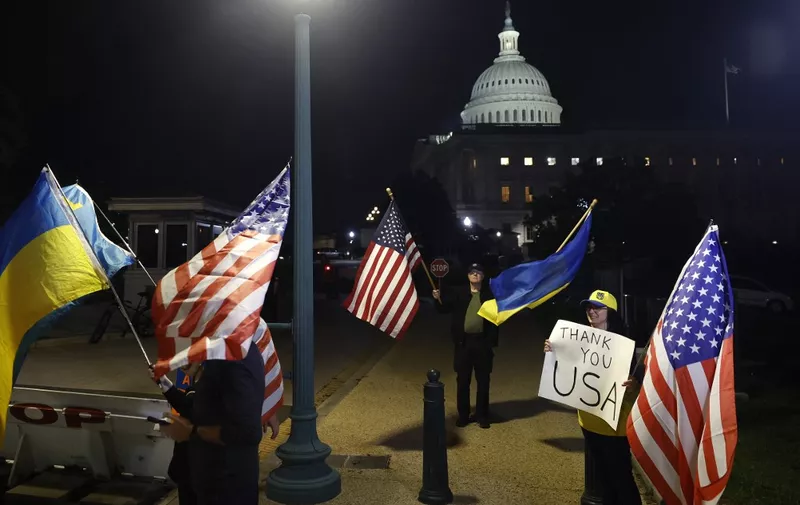 WASHINGTON, DC - APRIL 23: Supporters of Ukraine rally outside the U.S. Capitol after the Senate passed a foreign aid bill on April 23, 2024 in Washington, DC. The Senate passed the national security supplemental package which includes $95 billion in aid for Ukraine, Israel and Taiwan.   Kevin Dietsch/Getty Images/AFP (Photo by Kevin Dietsch / GETTY IMAGES NORTH AMERICA / Getty Images via AFP)