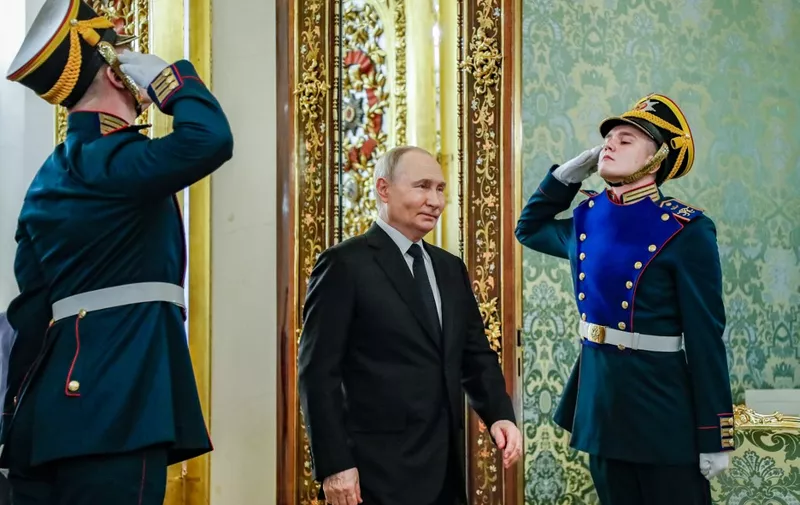 Russian President Vladimir Putin arrives to meet Bahrain's King at the Kremlin in Moscow on May 23, 2024. (Photo by YURI KOCHETKOV / POOL / AFP)