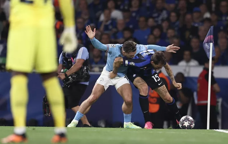 ISTANBUL, TURKIYE - JUNE 10: Jack Grealish (L) of Manchester City in action against Francesco Acerbi (15) of Inter during the UEFA Champions League final match between Manchester City and Inter at Ataturk Olympic Stadium in Istanbul, Turkiye on June 10,2023. Berk Ozkan / Anadolu Agency (Photo by Berk Ozkan / ANADOLU AGENCY / Anadolu Agency via AFP)