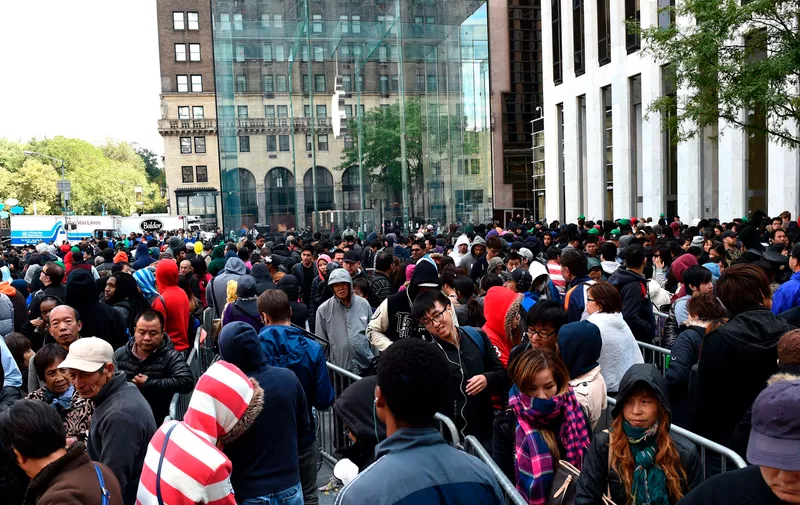 Lines of people wait to get in the Apple store on Fifth Avenue on September 19, 2014 in New York City to purchase the new iPhone 6. The California tech giant has said more than four million pre-orders were received in the 24 hours after the sale of the new devices was announced. Timothy Clary/AFP/Getty [&hellip;]