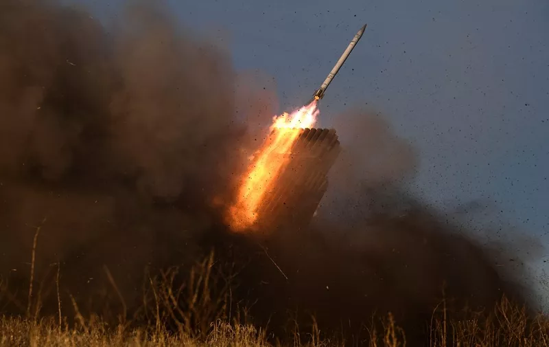 A BM-21 'Grad' multiple rocket launcher fires at Russian position in eastern Ukraine on September 22, 2022, amid the Russian invasion of Ukraine. (Photo by Juan BARRETO / AFP)