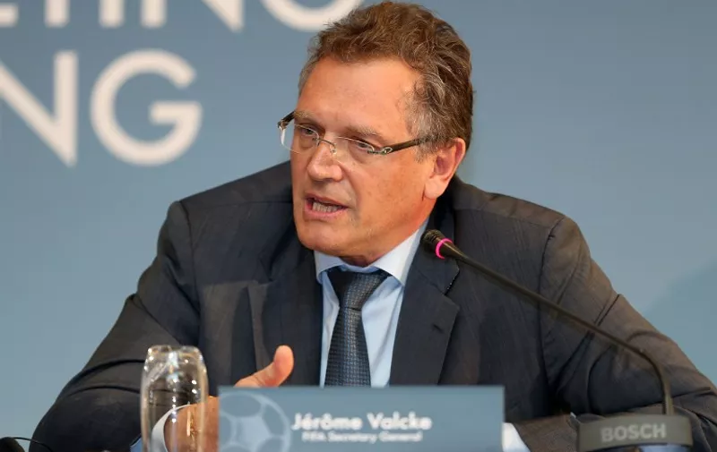 FIFA Secretary General Jerome Valcke speaks during a press conference to defend the football's ruling body's controversial proposal to shift the 2022 World Cup from the normal summer time slot to November/December on February 25, 2015 in Doha. Valcke said that European football clubs would not receive financial compensation for the 2022 World Cup being moved to November-December.    AFP PHOTO / KARIM JAAFAR
===QATAR OUT === / AFP / KARIM JAAFAR