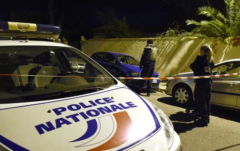 Police secure the near where a man was injured in a stabbing, on November 18, 2015 in the southern city of Marseille. A teacher at a Jewish school in the southern French city of Marseille was stabbed by three people shouting anti-Semitic obscenities and expressing support for the Islamic State group, local authorities said. The 57-year-old victim, who was wearing a kippa, was attacked outside his home, a short distance from the school and synagogue complex, a source close to the investigation said. AFP PHOTO / BORIS HORVAT / AFP / BORIS HORVAT