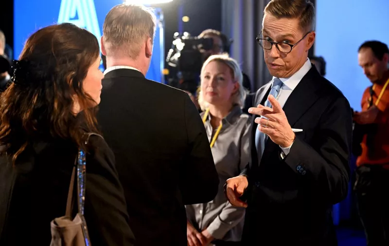 Finnish former prime minister and candidate of the National Coalition Party NCP Alexander Stubb (R) attends an election reception in Helsinki, Finland, during the first round of the presidential election, on January 28, 2024. Finns went to the polls to elect a new president, an office whose importance has grown on increased tensions with neighbouring Russia since the invasion of Ukraine. While the president's powers are limited, the head of state -- who also acts as supreme commander of Finland's armed forces -- helps direct foreign policy in collaboration with the government, meaning the changing geopolitical landscape in Europe will be the main concern for the winner. (Photo by Jussi Nukari / Lehtikuva / AFP) / Finland OUT