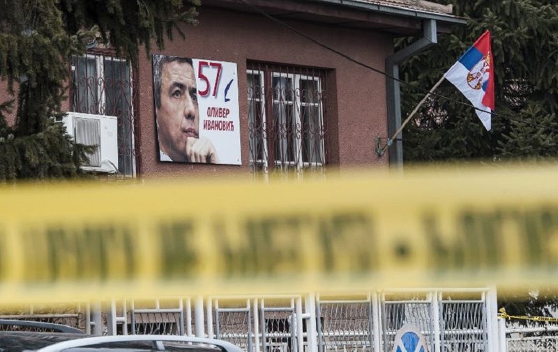 A poster bearing a picture of leading Kosovo Serb politician Oliver Ivanovic hangs on the wall of his offices after he was killed in a brazen drive-by shooting in Mitrovica on January 16, 2018.
The assassination of Ivanovic -- who was facing a retrial on war crimes charges over the 1990s Kosovo conflict --  occurred on the very day that Belgrade and Pristina resumed talks on normalising ties after a hiatus of more than a year. / AFP PHOTO / Armend NIMANI