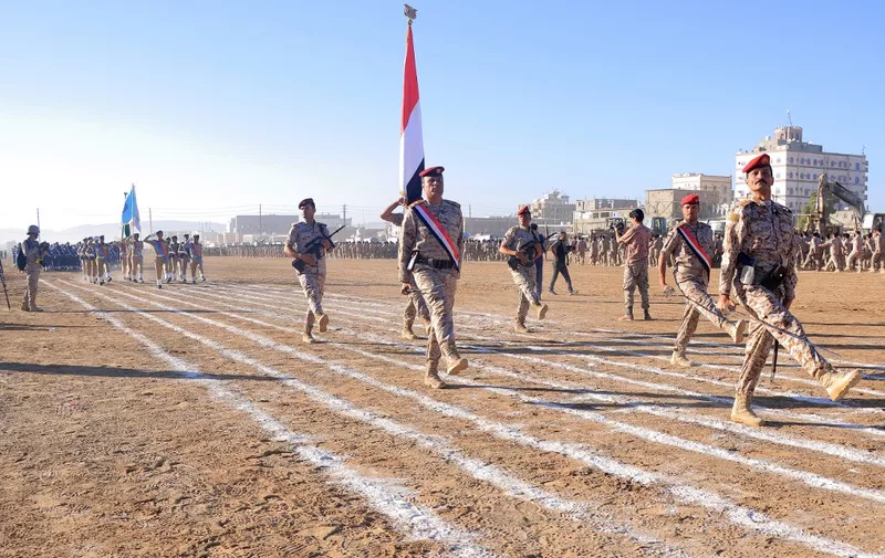 Yemeni soldiers parade during a graduation ceremony for new cadets of the armed forces of the Saudi-backed and internationally-recognised Yemeni government in the government-controlled northern city of Marib on January 14, 2024. (Photo by AFP)