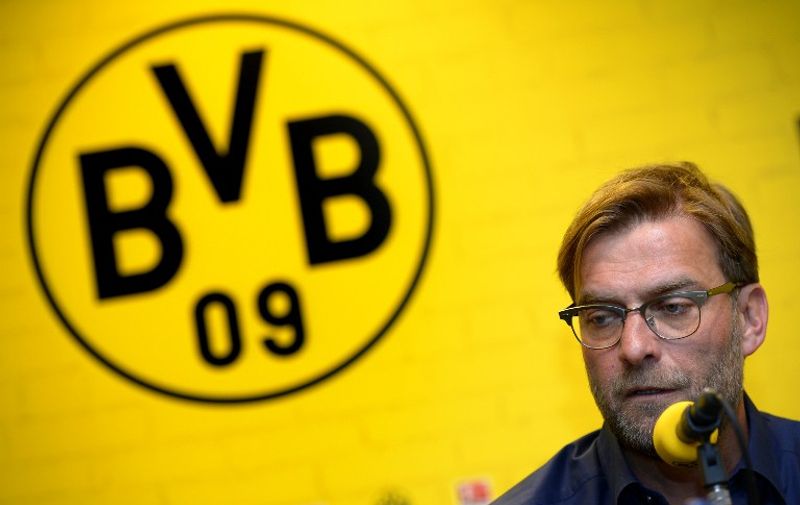 Dortmund&#8217;s head coach Juergen Klopp attends a press conference on April 15, 2015 in Dortmund, western Germany, to announce that he will step down as coach of German first division Bundesliga football club Borussia Dortmund (BVB). Klopp will quit as head coach at the end of the season after seven years in charge and two [&hellip;]