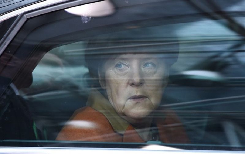 German Chancellor Angela Merkel arrives for an EU leaders summit with Turkey on migrants crisis on March 7, 2016 at the European Council, in Brussels.
European Union leaders will on March 7 back closing down the Balkans route used by most migrants to reach Europe, diplomats said, after at least 25 more people drowned trying to cross the Aegean Sea en route to Greece. The declaration drafted by EU ambassadors on March 6 will be announced at a summit in Brussels on March 7, set to also be attended by Turkish Prime Minister Ahmet Davutoglu.
 / AFP PHOTO / EMMANUEL DUNAND