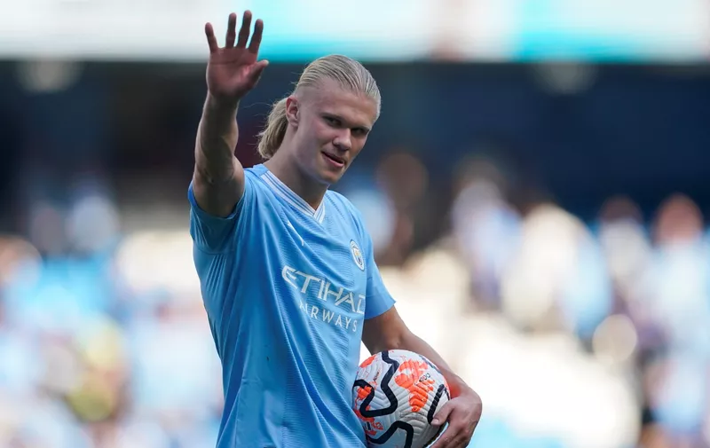 Manchester City's Erling Haaland celebrates at the end of the English Premier League soccer match between Manchester City and Fulham at the Etihad stadium in Manchester, England, Saturday, Sept. 2, 2023. (AP Photo/Dave Thompson)