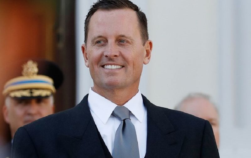 (FILES) In this file photo taken on May 08, 2018 then newly accredited US Ambassador to Germany Richard Allen Grenell stands in front of a military honor guard during an accreditation ceremony for new Ambassadors in Berlin. 
A German foreign ministry spokesman said Berlin had asked on June 4, 2018 the new US ambassador in Berlin, an outspoken Trump loyalist Richard Grenell, to clarify his reported comments on website Breitbart that he wants to "empower" European conservatives.  / AFP PHOTO / Odd ANDERSEN