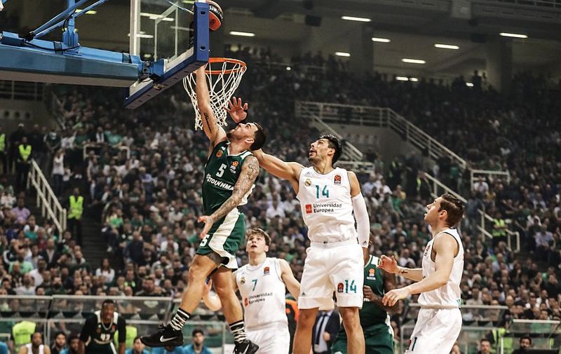 ATHENS, April 18, 2018 Panathinaikos&#8217; Mike James (Top L) dunks against Gustavo Ayon of Real Madrid during the match of Euroleague playoff between Panathinaikos and Real Madrid at the Athens Olympic Stadium in Athens, Greece, on April 17, 2018., Image: 368817715, License: Rights-managed, Restrictions: , Model Release: no, Credit line: Profimedia, Zuma Press &#8211; News