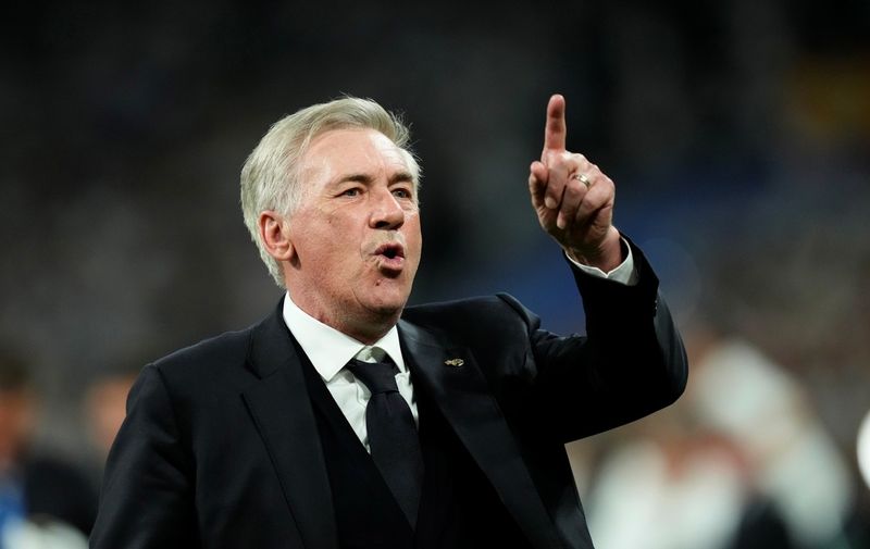 Real Madrid's head coach Carlo Ancelotti reacts after winning the Champions League semifinal second leg soccer match between Real Madrid and Bayern Munich at the Santiago Bernabeu stadium in Madrid, Spain, Wednesday, May 8, 2024. Real Madrid won 2-1. (AP Photo/Jose Breton)