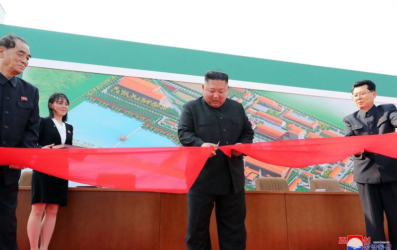 This picture taken on May 1, 2020 and released from North Korea's official Korean Central News Agency (KCNA) on May 2, 2020 shows North Korean leader Kim Jong Un (2nd R)  attending a ceremony to mark the completion of Sunchon phosphatic fertilizer factory in South Pyongan Province, North Korea. (Photo by STR / KCNA VIA KNS / AFP) / - South Korea OUT / ---EDITORS NOTE--- RESTRICTED TO EDITORIAL USE - MANDATORY CREDIT "AFP PHOTO/KCNA VIA KNS" - NO MARKETING NO ADVERTISING CAMPAIGNS - DISTRIBUTED AS A SERVICE TO CLIENTS / THIS PICTURE WAS MADE AVAILABLE BY A THIRD PARTY. AFP CAN NOT INDEPENDENTLY VERIFY THE AUTHENTICITY, LOCATION, DATE AND CONTENT OF THIS IMAGE --- /