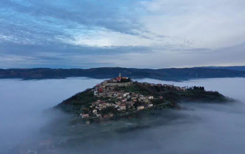 Town of Motovun surrounded by morning fog. (National Geographic)