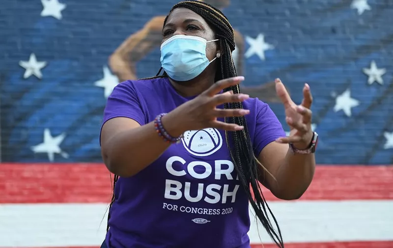 ST LOUIS, MO - AUGUST 03: Missouri Democratic congressional candidate Cori Bush speaks to supporters during a canvassing event on August 3, 2020 in St Louis, Missouri. Bush, an activist backed by the progressive group Justice Democrats, is looking to defeat 10-term incumbent Rep. William Lacy Clay (D-MO) in Tuesday's election.   Michael B. Thomas/Getty Images/AFP