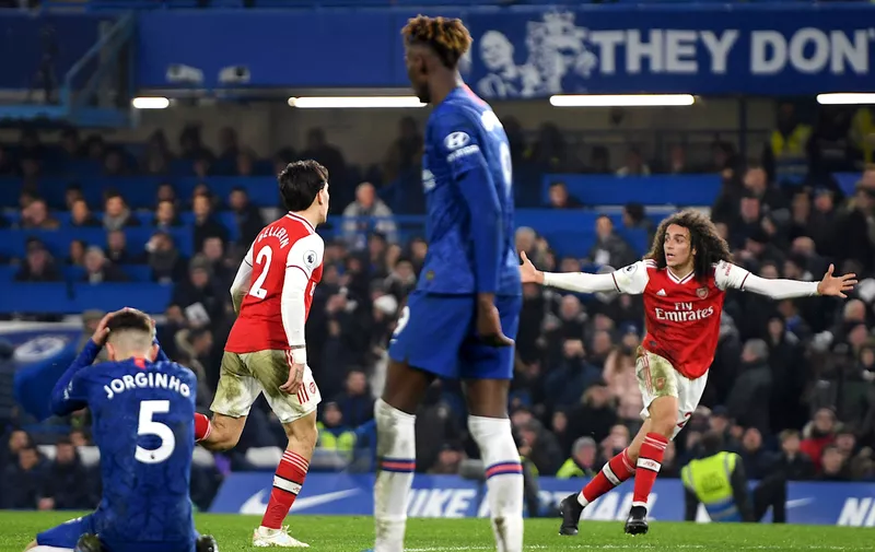 LONDON, ENGLAND - JANUARY 21: Hector Bellerin of Arsenal celebrates with Matteo Guendouzi after scoring his team's second goal during the Premier League match between Chelsea FC and Arsenal FC at Stamford Bridge on January 21, 2020 in London, United Kingdom. (Photo by Mike Hewitt/Getty Images)