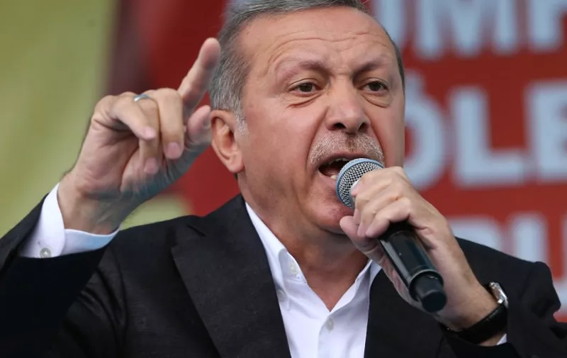 Turkish President Recep Tayyip Erdogan speaks during a rally in Golbasi district of Ankara on June 5, 2015. AFP PHOTO / ADEM ALTAN