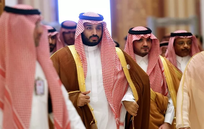 Saudi Defence Minister Mohammed bin Salman (2nd L),  who is the desert kingdom's deputy crown prince and second-in-line to the throne, arrives at the closing session of the 4th Summit of Arab States and South American countries held in the Saudi capital Riyadh, on November 11, 2015. The summit is aimed to strengthen ties between the geographically distant but economically powerful regions.  AFP PHOTO / FAYEZ NURELDINE / AFP PHOTO / FAYEZ NURELDINE