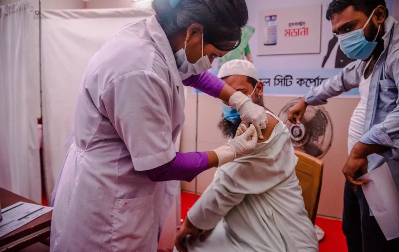A health worker inoculates a man with the jab of Moderna Covid-19 coronavirus vaccine during a mass vaccination camp at Barishal in Bangladesh.
Mass Vaccination Campaign in Bangladesh, Barishal, Barishal, Bangladesh - 24 Aug 2022,Image: 716281814, License: Rights-managed, Restrictions: , Model Release: no