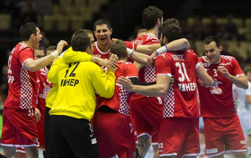 Players from Croatia celebrate after beating Norway in their Men's Handball Olympic Qualification match in Herning, on April 10, 2016.   / AFP PHOTO / Scanpix Denmark / Frank Cilius / Denmark OUT
