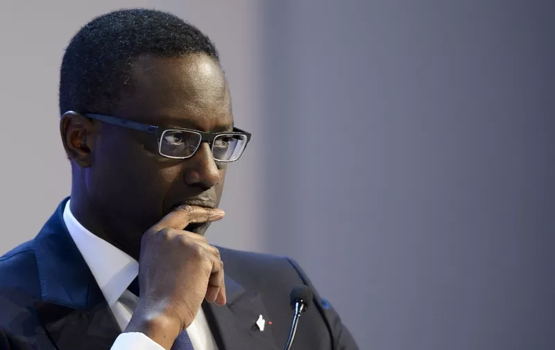 (FILES) In this file photo taken on January 23, 2016 Ivory Coast-born French Credit Suisse CEO Tidjane Thiam looks on during a session of the World Economic Forum annual meeting. - Credit Suisse, which has been rocked by a spying scandal, announced on February 7, 2020 that chief executive Tidjane Thiam had resigned and would be replaced by the current head of the bank's Swiss operations. (Photo by FABRICE COFFRINI / AFP)