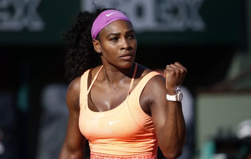 US player Serena Williams reacts during her match against Switzerland's Timea Bacsinszky during their women's semi-final match of the Roland Garros 2015 French Tennis Open in Paris on June 4, 2015.  AFP PHOTO / KENZO TRIBOUILLARD