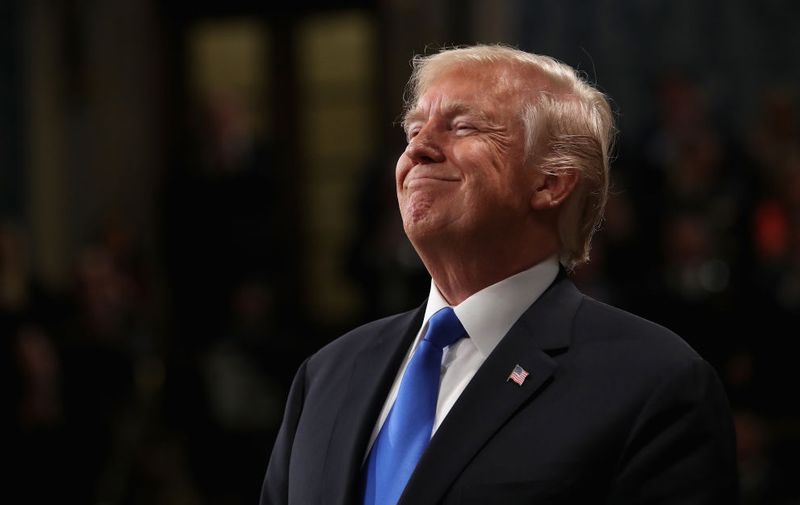 WASHINGTON, DC - JANUARY 30:  U.S. President Donald J. Trump smiles during the State of the Union address in the chamber of the U.S. House of Representatives January 30, 2018 in Washington, DC. This is the first State of the Union address given by U.S. President Donald Trump and his second joint-session address to Congress.  (Photo by Win McNamee/Getty Images)