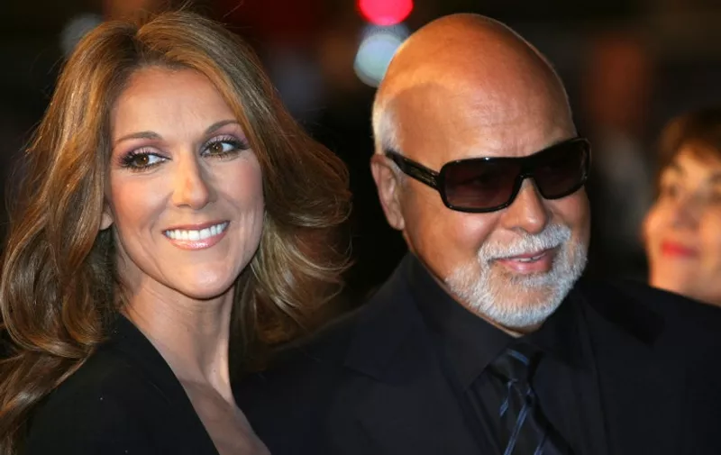 (FILES) Canadian singer Celine Dion and husband Rene Angelil pose upon arrival at the Palais des Festivals in Cannes, southern France, in this January 26, 2008, file photo.
Angelil, who discovered the Canadian pop diva and long managed her career, died on January 14, 2016, in Las Vegas at age 73  after a long battle with cancer, a spokesman said. "The family asks that they be left to mourn in private. More information will be given in the coming days," said the spokesman for the singer, Marc Olivier.
 / AFP / AFP FILES / VALERY HACHE