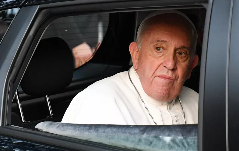 Pope Francis leaves the Catholic humanitarian organisation Caritas, after meeting with migrants, in the Moroccan capital Rabat on the first day of his visit to the north African country on March 30, 2019. - Pope Francis, the spiritual leader of the world's 1.3 billion Catholics, was invited by King Mohammed VI of Morocco for the sake of "interreligious dialogue", according to Moroccan authorities. (Photo by Alberto PIZZOLI / AFP)