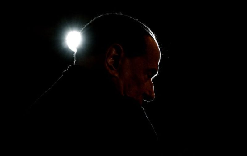 Leader of the Italian right-wing party Forza Italia (Go Italy) Silvio Berlusconi looks on during a campaign rally in Milan on February 25, 2018, ahead of the Italian general elections of next week.
Silvio Berlusconi, the billionaire media mogul who dominated Italian politics for nearly two decades, has stepped back into the ring at the age of 81, defying those who dared to believe he had thrown in the towel. Despite sex scandals, serial gaffes and legal woes, the flamboyant tycoon has made an astonishing return from political oblivion to head his centre-right Forza Italia (Go Italy) party, which as part of a rightwing coalition is leading the race for the March 4, 2018 vote.   / AFP PHOTO / Piero CRUCIATTI