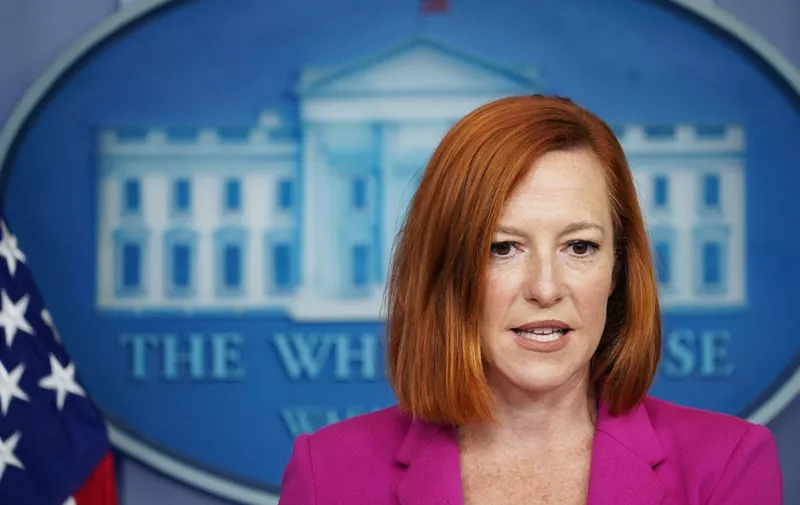 (FILES) In this file photo taken on October 22, 2021, White House Press Secretary Jen Psaki speaks during the daily press briefing in the Brady Briefing Room of the White House in Washington, DC. - White House spokeswoman Jen Psaki said October 31, 2021 that she has tested positive for Covid-19, after deciding not to travel to Europe with US President Joe Biden when members of her family contracted the virus. (Photo by MANDEL NGAN / AFP)