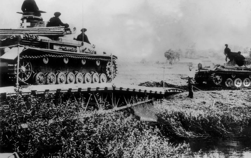 Germans tanks cross 06 September 1939 a river into Polish territory. (Photo by AFP)