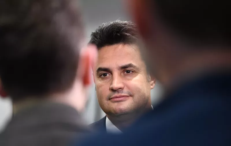 Hungarian prime ministerial candidate of the Everybody's Hungary Movement, the mayor of Hodmezovasarhely town Peter Marki-Zay, answers journalists before a press conference in Brussels on November 11, 2021. (Photo by JOHN THYS / AFP)