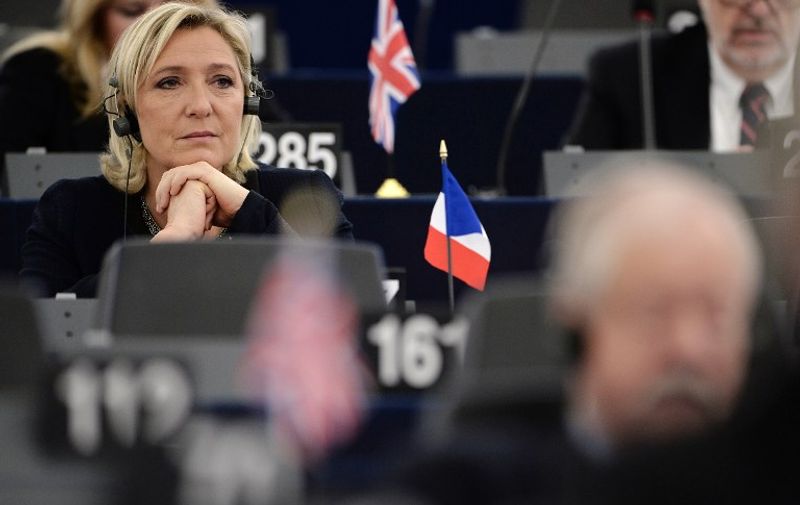 French Front National (National Front - FN) far-right party's President, European MP and candidate for the 2017 French Presidential elections Marine Le Pen  attends a debate on the conclusions of the European Council meeting on October 20-21 at the European Parliament in Strasbourg, eastern France, on October 26, 2016.  / AFP PHOTO / FREDERICK FLORIN