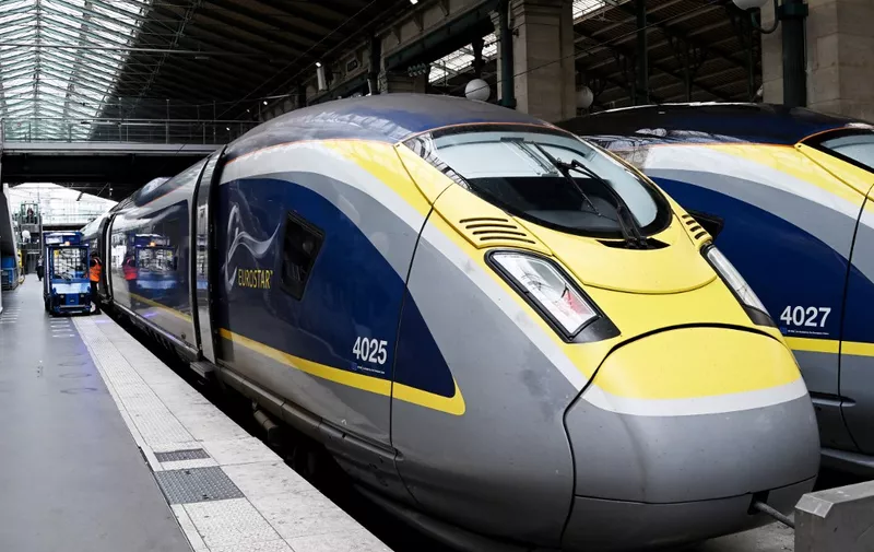 A Eurostar train is parked at a platform of the Paris' Gare du Nord station on August 3, 2023. (Photo by Stefano RELLANDINI / AFP)