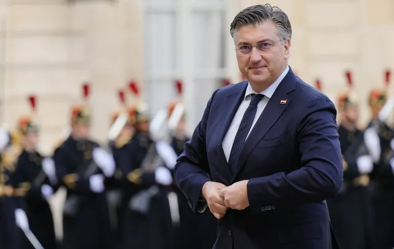 Croatia's Prime Minister Andrej Plenkovic arrives for a lunch as part of a national tribute ceremony for late French minister and European Union Commission president Jacques Delors at the Elysee palace in Paris, on January 5, 2024. Delors, a key figure in the creation of the euro, died on December 27, 2023 aged 98. (Photo by Dimitar DILKOFF / AFP)
