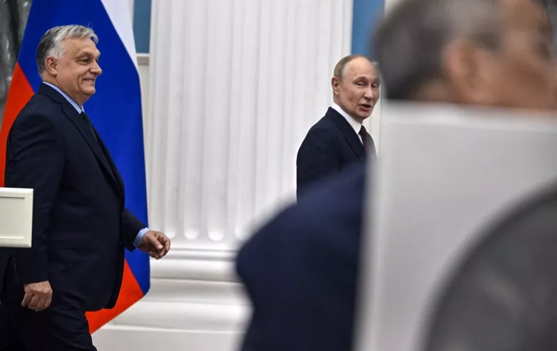 Russia's President Vladimir Putin and Hungary's Prime Minister Viktor Orban (L) leave after a joint press statement following their talks at the Kremlin in Moscow on July 5, 2024. (Photo by Alexander NEMENOV / AFP)