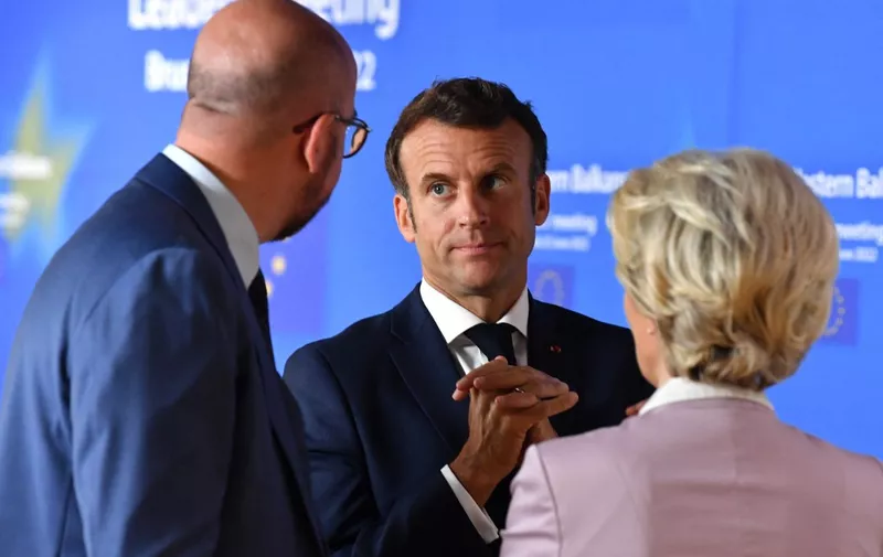 From left: President of the European Council Charles Michel, France's President Emmanuel Macron and President of the European Commission Ursula von der Leyen speak prior to the start of the EU-Western Balkans leaders' meeting in Brussels on June 23, 2022. - The European Union, which at a summit on June 23 and 24, 2022, will discuss whether to make Ukraine a membership candidate, has admitted over 15 countries in the past three decades. (Photo by JOHN THYS / POOL / AFP)