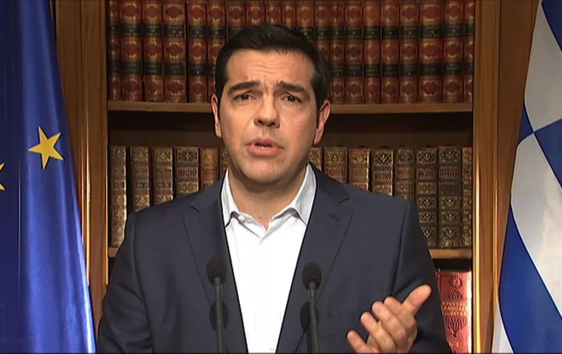 A TV grab shows Greek Prime Minister's address Alexis Tsipras addressing the nation in Athens on July 1, 2015. Nearly one in two Greeks intend to vote 'No' in a weekend referendum on the terms of its bailout, but capital controls are boosting the 'Yes' camp, a poll showed today. Prime Minister Alexis Tsipras has called on Greeks to vote 'No' in the plebiscite, which will ask voters whether they want to accept the latest deal from Athens' creditors -- a deal he has branded "humiliating".  AFP PHOTO / ERT