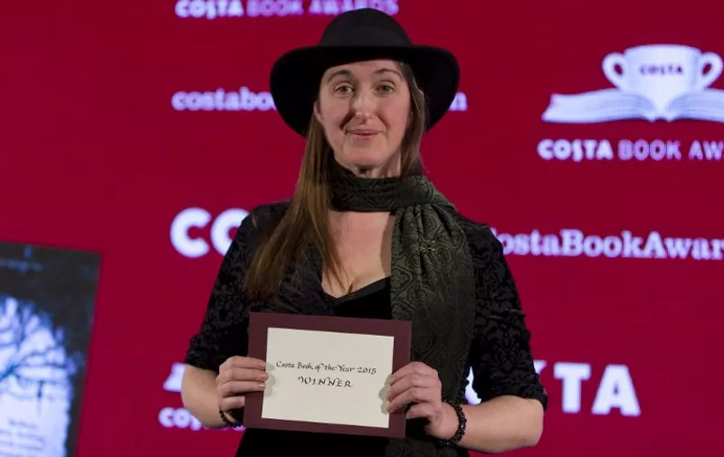 British author Frances Hardinge smiles after being awarded the overall winner of the Costa Book Awards 2015 for her Childrens Book "The Lie Tree" in London on January 26, 2016. / AFP / JUSTIN TALLIS
