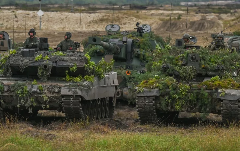 The German Leopard tanks used by Polish army and  the AHS Krab, a 155 mm NATO-compatible self-propelled tracked gun-howitzer, are seen at the training ground in Nowa Deba on September 21, 2022, in Nowa Deba, Subcarpathian Voivodeship, Poland.
Soldiers from Poland, the USA and Great Britain take part in the joint military exercise 'BEAR 22' (Polish: Niedzwiedz 22') in the Eastern Poland. (Photo by Artur Widak/NurPhoto) (Photo by Artur Widak / NurPhoto / NurPhoto via AFP)