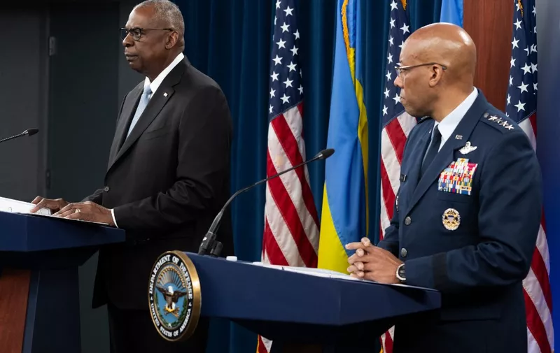 US Secretary of Defense Lloyd Austin (L) and Chairman of the Joint Chiefs of Staff Charles Q. Brown Jr. speak during amedia briefing at the Pentagon in Washington, DC on May 20, 2024. (Photo by SAUL LOEB / AFP)
