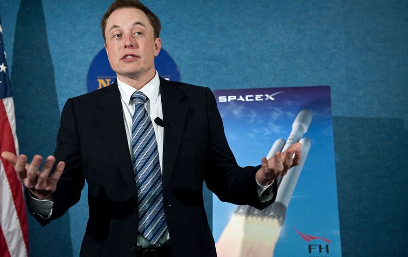 (FILES) Photo dated April 5, 2011 shows SpaceX CEO Elon Musk unveiling the Falcon Heavy rocket at the National Press Club in Washington. SpaceX is scheduled to launch its Dragon capsule to the International Space Station (ISS) on May 19. AFP PHOTO/FILES/Nicholas KAMMNICHOLAS KAMM/AFP/GettyImages ORG XMIT: