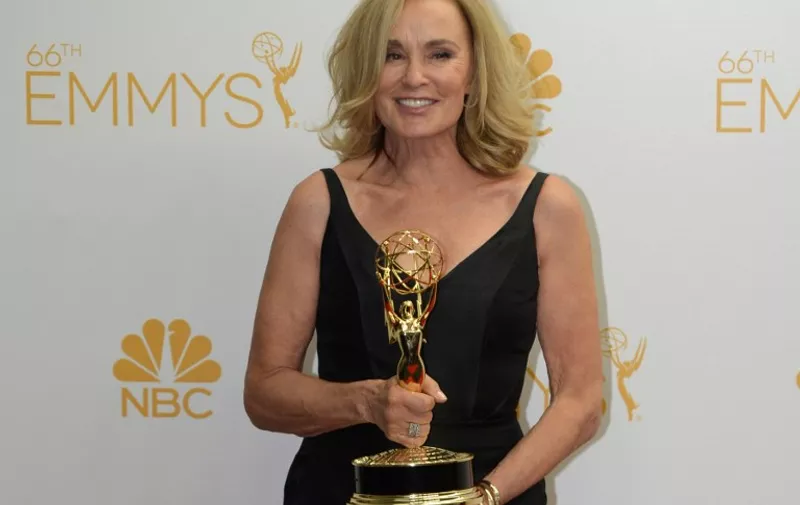 Actress Jessica Lange poses in the press room after winning Outstanding Lead Actress in a Miniseries or Movie for 'American Horror Story: Coven'  during the 66th Emmy Awards, August 25, 2014 at the Nokia Theatre in downtown Los Angeles.   AFP PHOTO / Mark Ralston